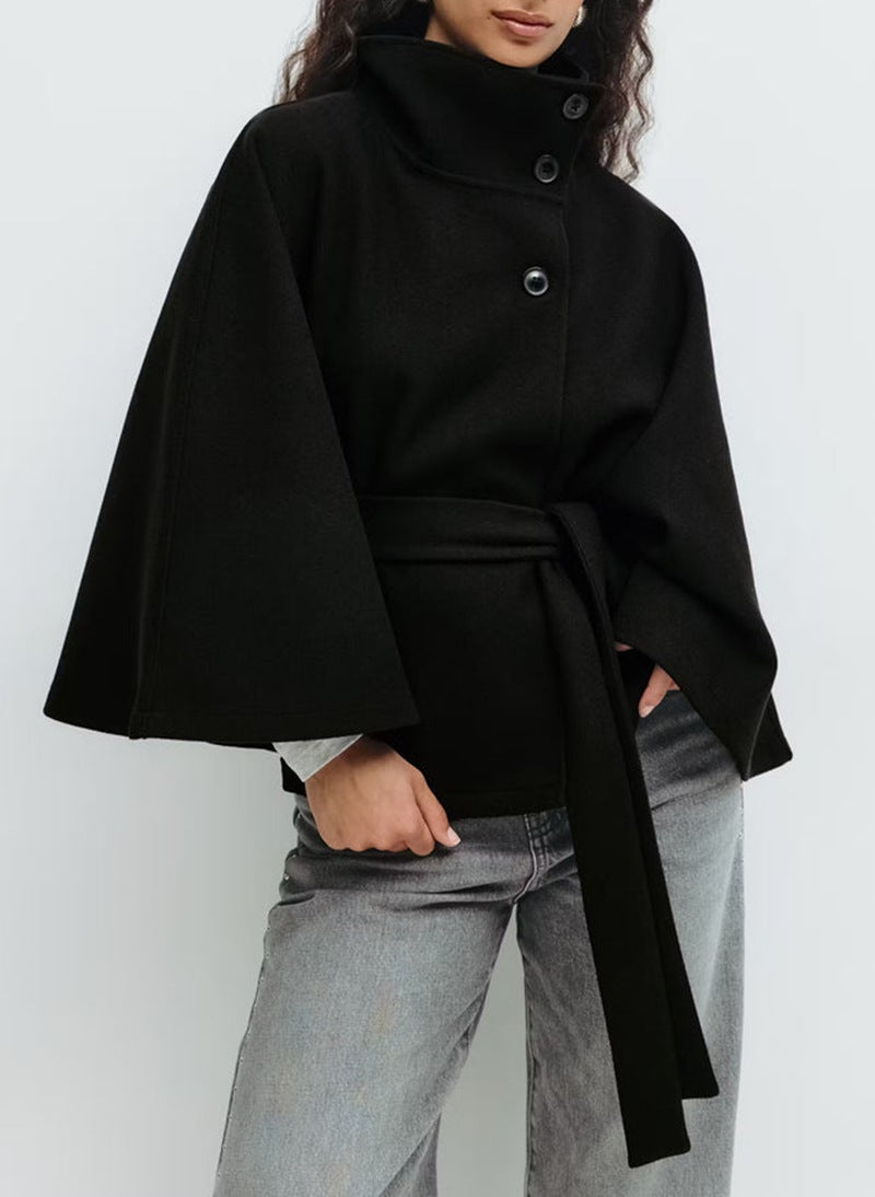Trench Coat With A Stand-up Collar Buttons And A Belt