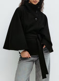 Trench Coat With A Stand-up Collar Buttons And A Belt